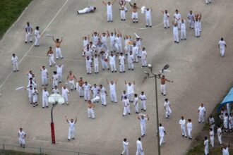 In an aerial view from a helicopter, detainees are seen at Krome Detention Center, run by Immigration and Customs Enforcement, on July 4, 2025 in Miami, Florida.