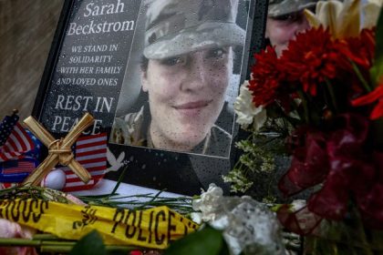 A makeshift memorial honors slain West Virginia National Guard member Sarah Beckstrom, who was shot with fellow guard member Andrew Wolfe outside a subway station near the White House, in Washington, D.C., Dec. 2, 2025.