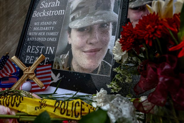A makeshift memorial honors slain West Virginia National Guard member Sarah Beckstrom, who was shot with fellow guard member Andrew Wolfe outside a subway station near the White House, in Washington, D.C., Dec. 2, 2025.