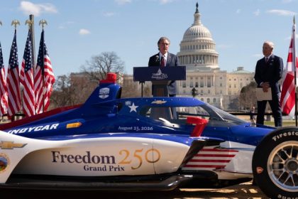 Interior Secretary Doug Burgum speaks during the announcement of the street race circuit "Freedom 250 Grand Prix Washington, D.C." next to a IndyCar show car on Monday March 9, 2026, in Washington.